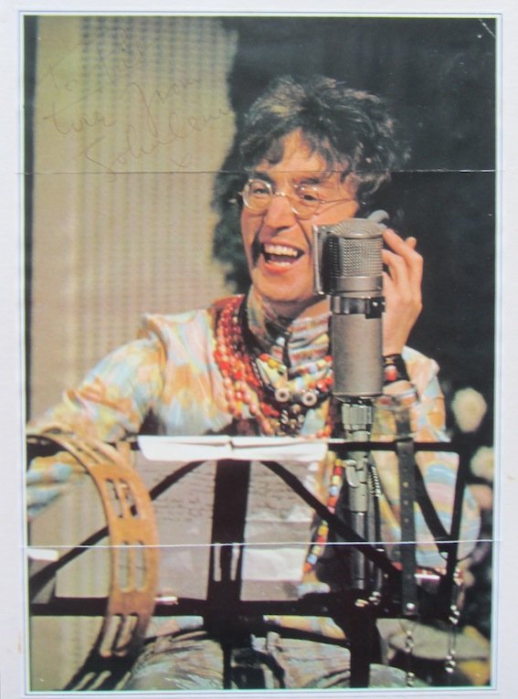 John Lennon signed magazine photo: John Lennon. An 8 x 10 colour magazine photograph of John Lennon during the all you need is love broadcast signed “to Pat love from John Lennon x”