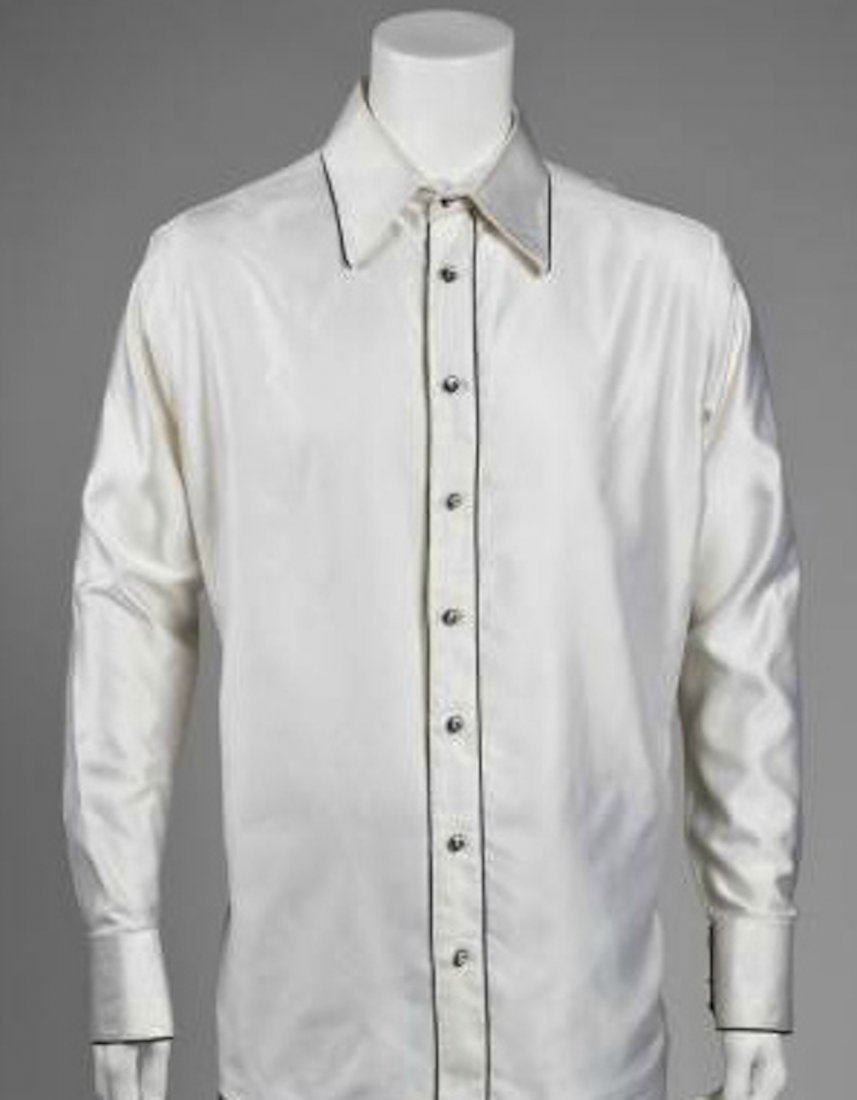 Meat Loaf owned/worn concert shirt: Meat Loaf - Concert worn. A white silk shirt with black lining and rhinestone buttons, together with a pair of grey trousers with black chenille embroidery near the hem. Both have "Ali Rahimi for Mon