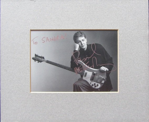 Paul McCartney. A 1987 MPL post- card dedicated and: Paul McCartney. A 1987 MPL postcard dedicated and signed “to Sandra, Paul McCartney