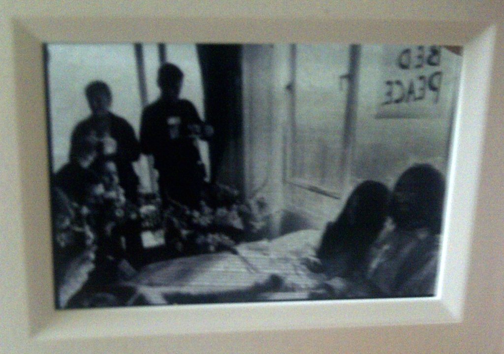 John Lennon/Yoko Ono Amsterdam bed in negative: A 35mm negative of John Lennon and Yoko Ono peace demostration - 25th March 1969. Having been driven from Paris to Amsterdam early in the morning, John Lennon and Yoko Ono checked into the Hilton Hote