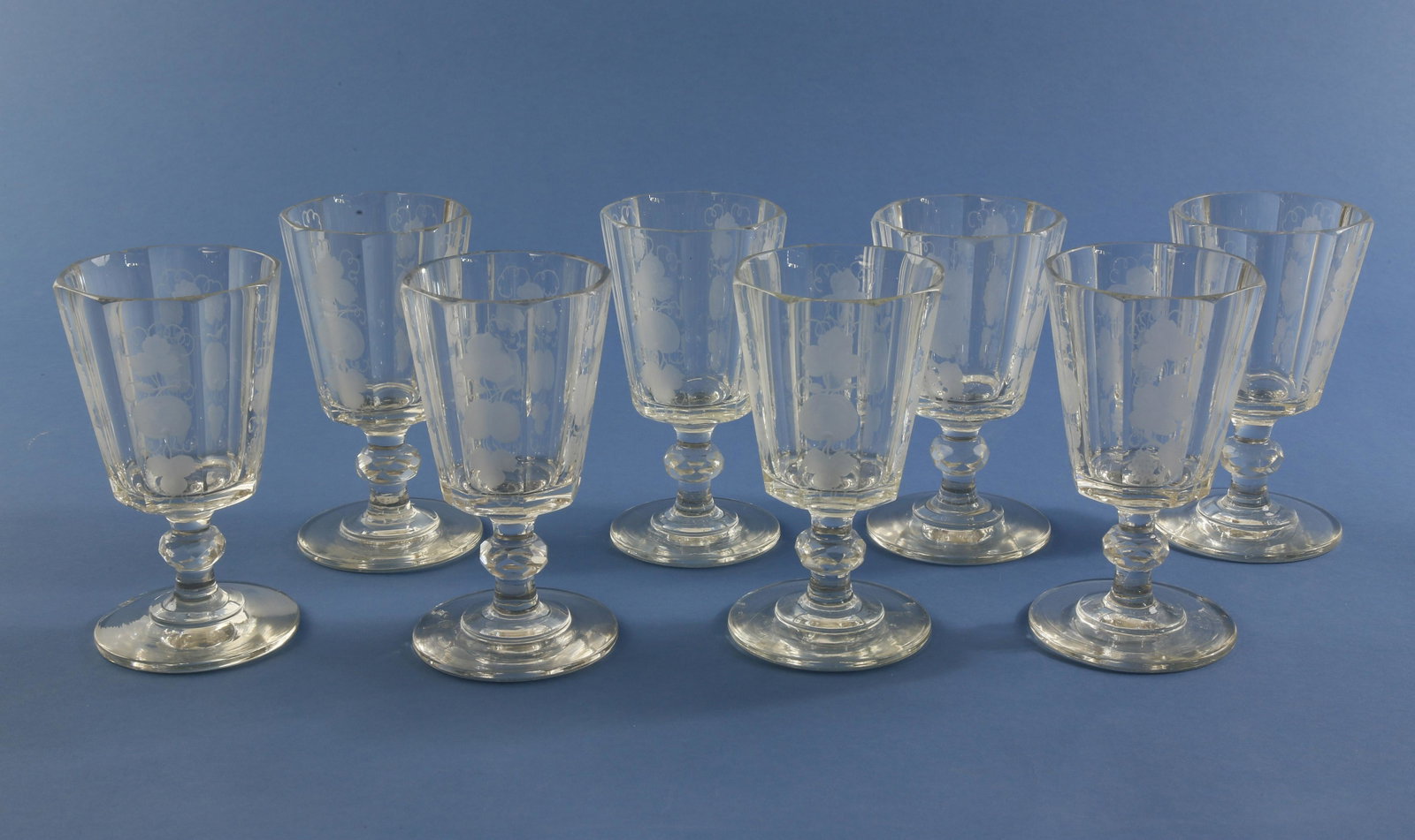 8 Grape and Leaf Cut Crystal Engraved Wine Glasses: Set of Eight Grape and Leaf Cut Crystal Pedestal Engraved Wine Glasses Height 6 ¼ in. Provenance: Estate of Linda Loring, 6 Louisburg Square, Boston