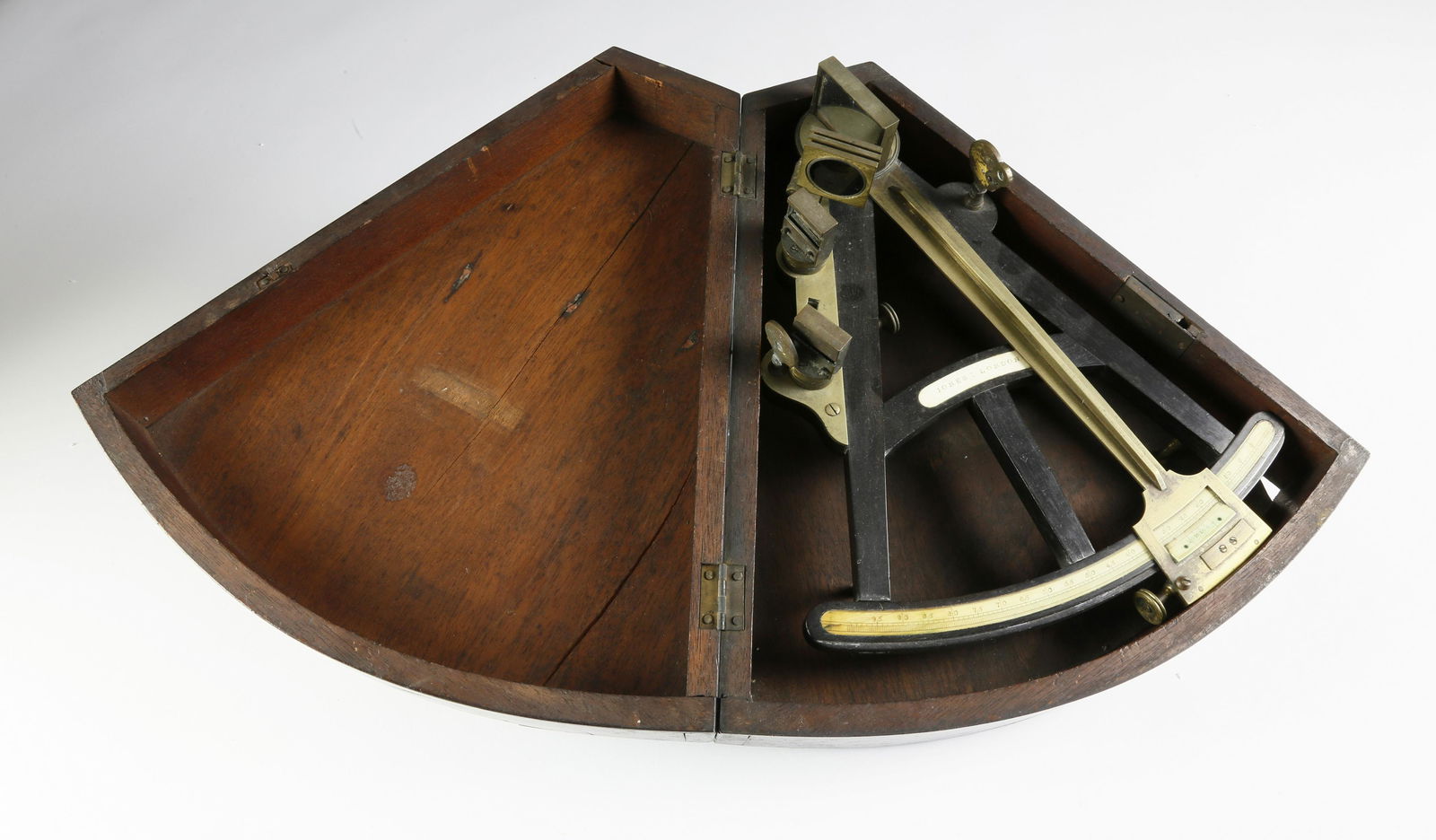 Quadrant by Jones - London, circa 1820: Quadrant by Jones - London, circa 1820, ebony frame with ivory name plate and scale and brass mounts in original dovetailed box. 13 in. x 12 ½ in. x 4 in.
