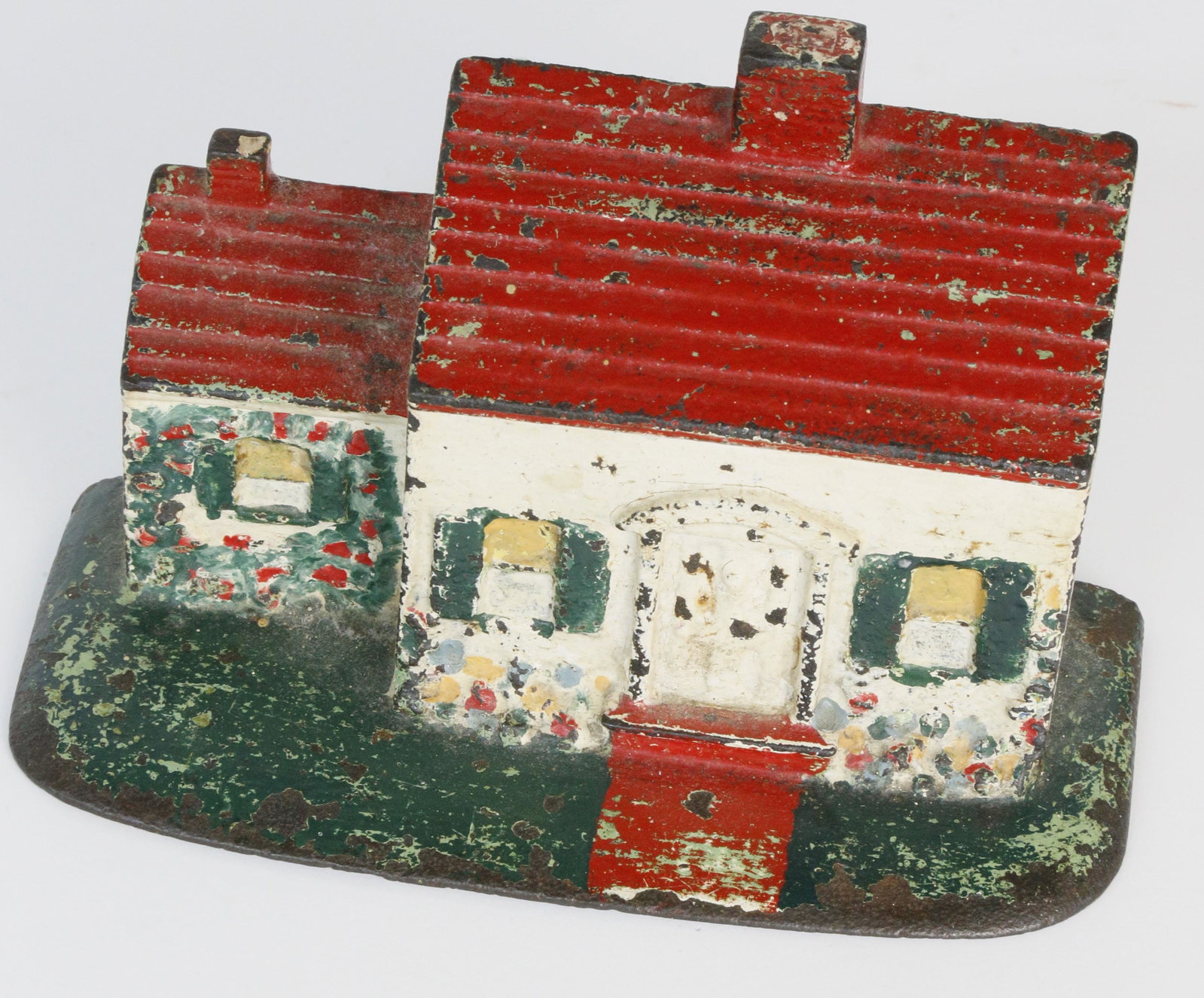 Scarce Antique Cast Iron Double Chimney New England: Scarce Antique Cast Iron Double Chimney New England Cottage Doorstop, circa 1920, unusual deep form. Height 4 ½ in. Width 7 ½ in. Depth 3 ½ in.