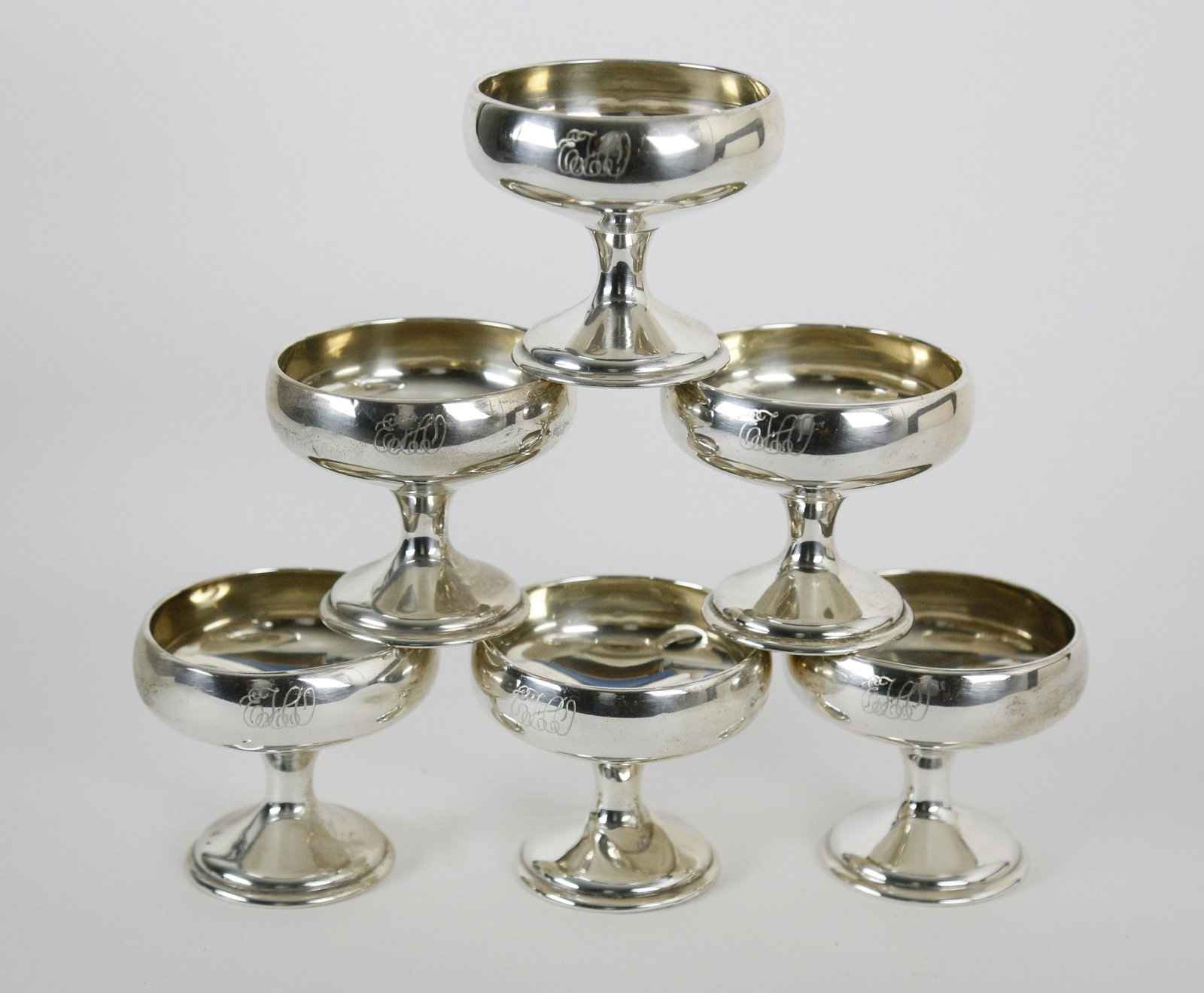 Set of Six Sterling Silver Champagne Glasses: Set of Six Sterling Silver Champagne Glasses, each monogrammed, "EHW". Height 3 in. Provenance: Estate of Linda Loring, 4 Rays Court, Nantucket