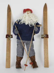 Vintage Handmade Limited-Edition Skiing Santa Claus: Vintage Handmade Limited-Edition Skiing Santa Claus Christmas Figure, signed illegibly on ski, "99 #2/200, with wooden skis. Height 24 in. Dimensions Height 24 in. Origin 20th Century