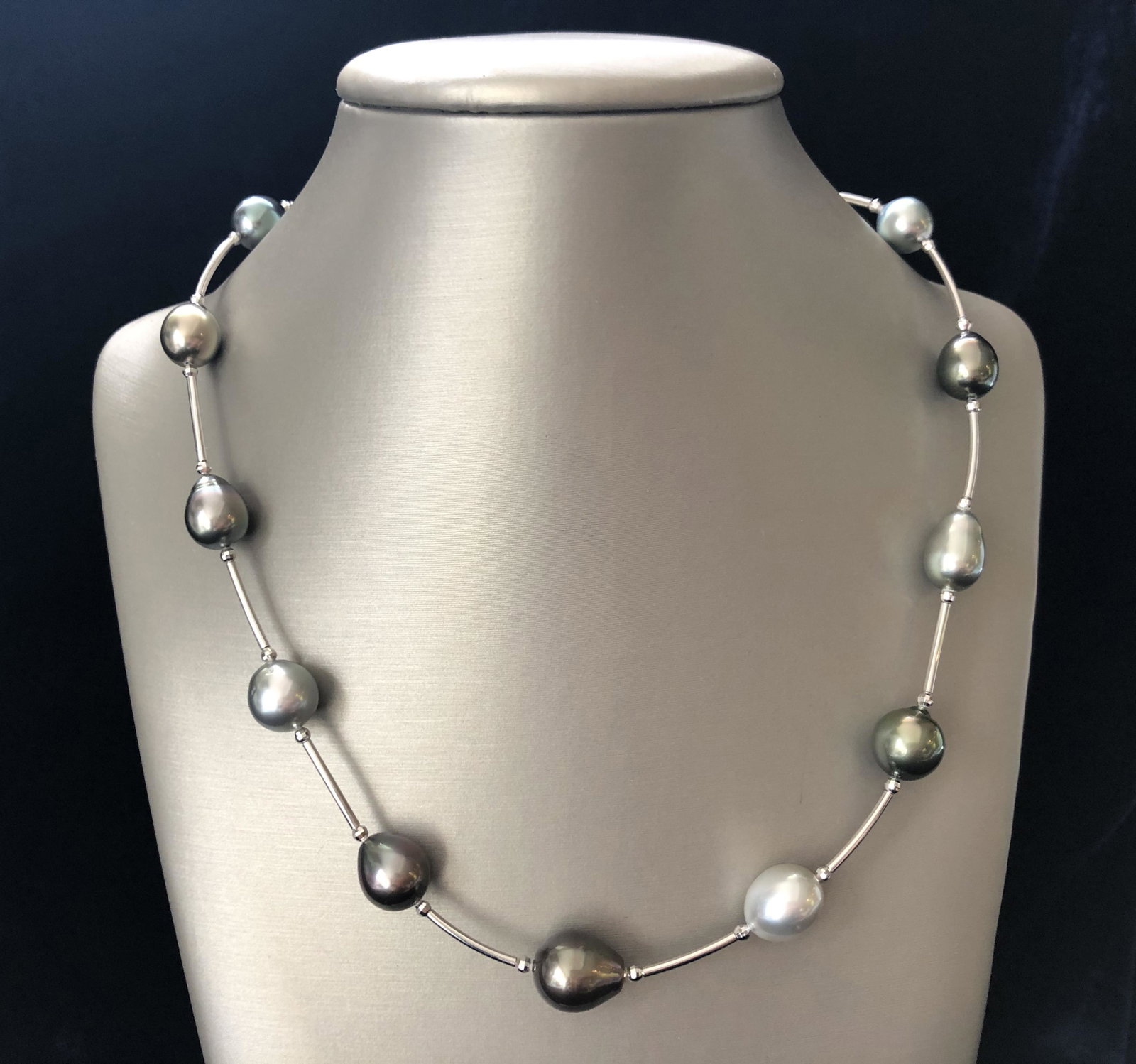 Tahitian Grey Pearl Tin Cup Necklace: 8mm-11.5mm Tahitian Grey Pearl Tin Cup Necklace, with sterling silver spacers. Length 16.5 in. Dimensions Length 16.5 in. Origin 21st Century