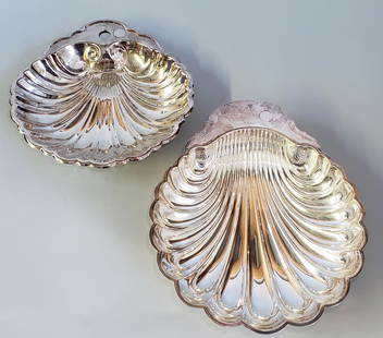 Two Silver Plated Scallop Shell Formed Dishes: Two Silver Plated Scallop Shell Formed Dishes, the larger stamped, "WM Rogers 895". 13.25 in. x 11 in. and 11 in. x 10.75 in. Dimensions 13.25 in. x 11 in. and 11 in. x 10.75 in.