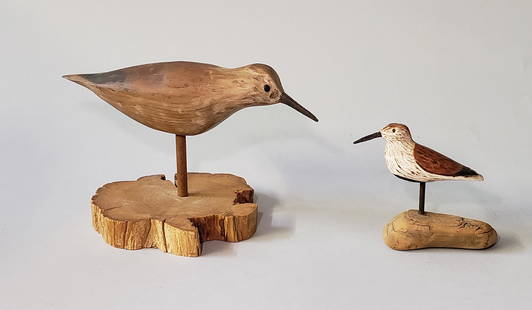 Two Hand Carved and Painted Shorebird Decoys: Two Hand Carved and Painted Shorebird Decoys, each signed upon the base, "Barke 1982 #144 and 198", mounted on driftwood. Height 4.5 in. Width 7 in. Dimensions Height 4.5 in. Width 7 in.