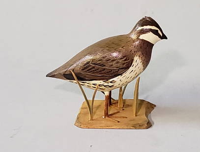 Carved and Painted Quail Decoy: Miniature Hand Carved and Painted Quail Decoy, signed upon the base, "F.J.A". Height 2.5 in. Width 3.5 in. Dimensions Height 2.5 in. Width 3.5 in.