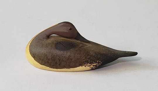 Miniature Hand Carved and Painted Duck Decoy: Miniature Hand Carved and Painted Duck Decoy, signed upon the base, "F.J.A" Height 1.75 in. Width 4.75 in. Dimensions Height 1.75 in. Width 4.75 in.