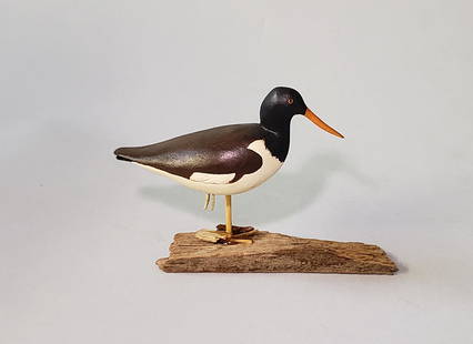Miniature Hand Carved and Painted Shorebird Decoy: Miniature Hand Carved and Painted Shorebird Decoy, mounted on drift wood signed upon the base, "F.J.A.". Height 2.5 in. Width 4 in. Dimensions Height 2.5 in. Width 4 in.