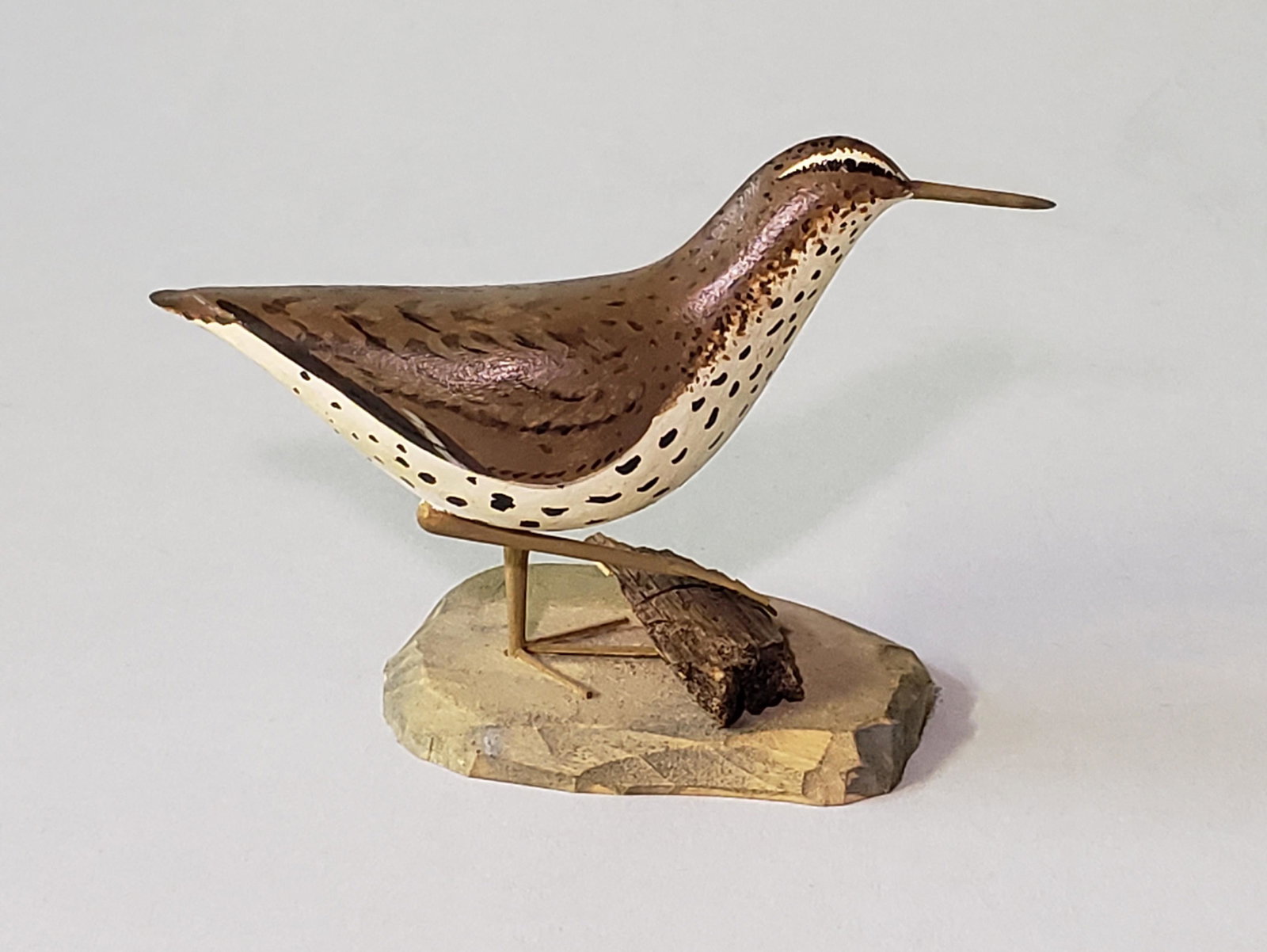 Miniature Hand Carved and Painted Shorebird Decoy: Miniature Hand Carved and Painted Shorebird Decoy, signed upon the base, "F.J.A." Height 2.5 in. Width 4 in. Dimensions Height 2.5 in. Width 4 in.