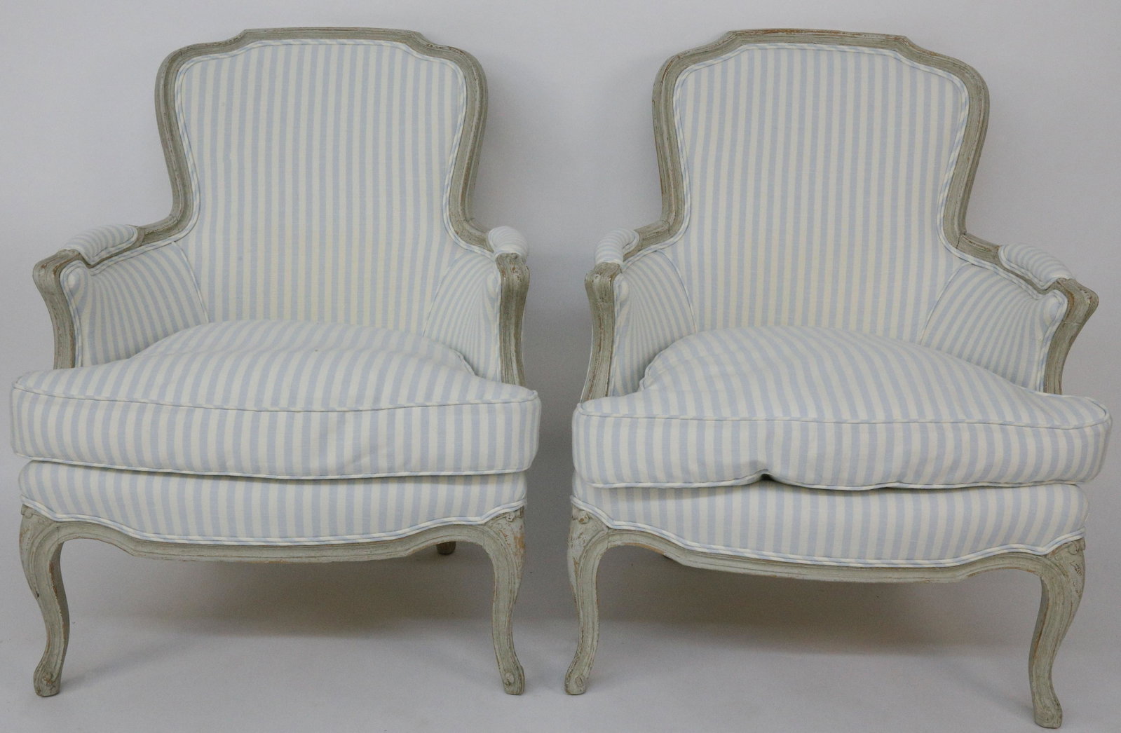 Pair of Louis XV Upholstered Fauteuils, 19th Century: Pair of Louis XV Upholstered Fauteuils, 19th century, in blue and creme fabric, white washed finish Height 34 in. Width 28 in. Depth 24 in. Dimensions: Height 34 in. Width 28 in. Depth 24 in. Circa: