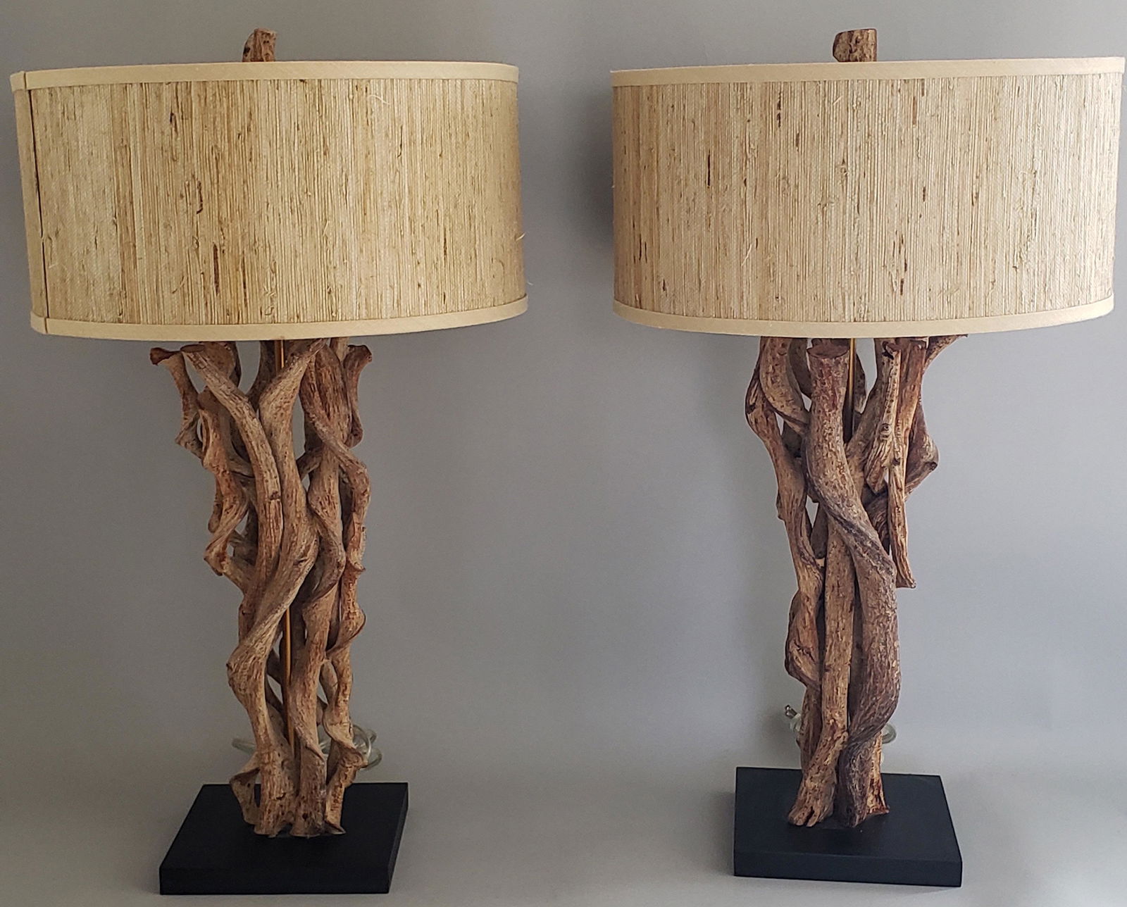 Pair of Jamie Young Driftwood Lamps: Pair of Jamie Young Driftwood Lamps, matching finials, signed upon the base Height to Top of Wood 19.5 in. Dimensions: Height to Top of Wood 19.5 in. Circa: 21st Century