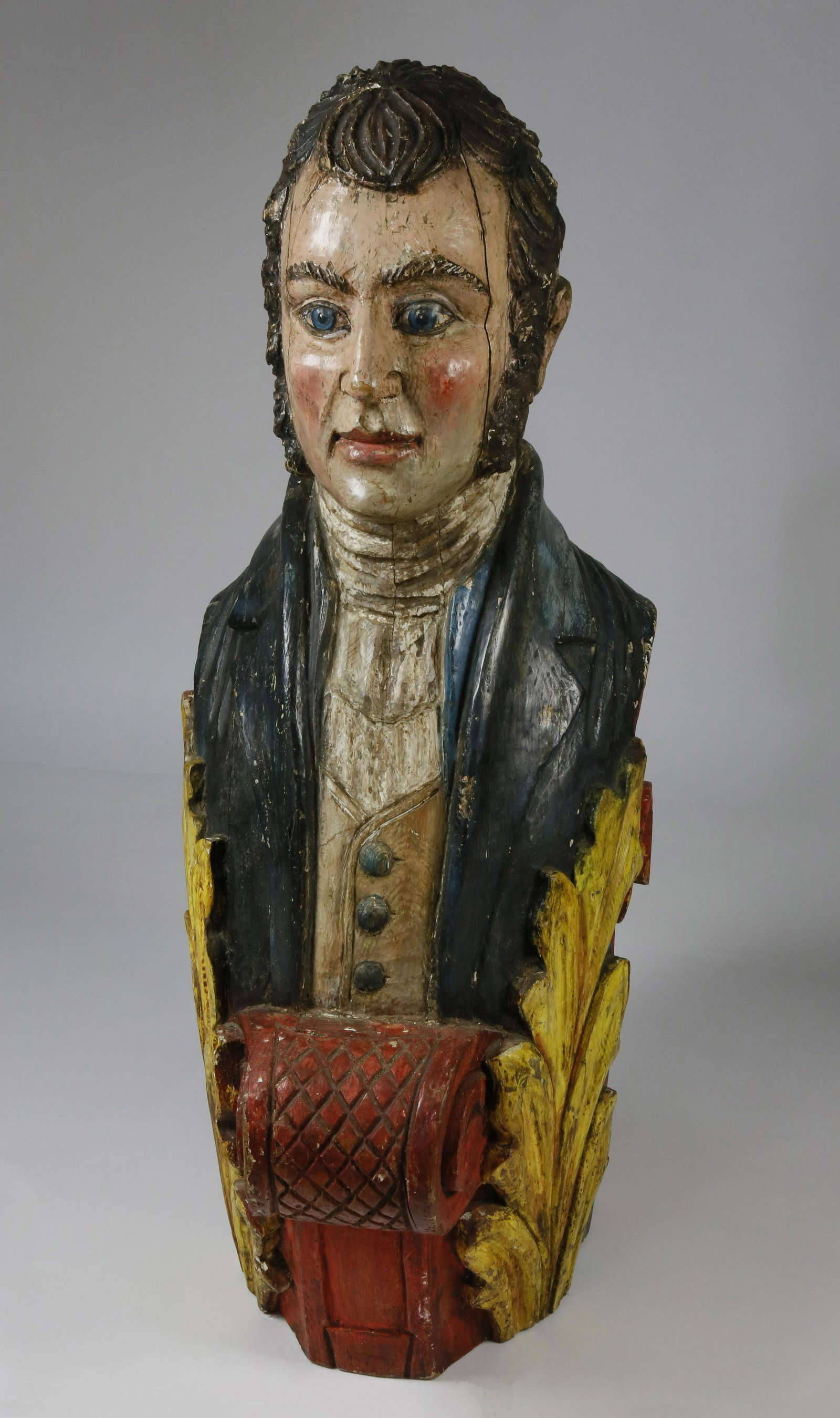 Vintage Ship's Figurehead Style Carving: Vintage Ship's Figurehead Style Carving of a 19th Century Gentleman, boldly carved and painted laminated sectional construction with billet head and foliate details. Height 38 in. Width 14 in. Depth 