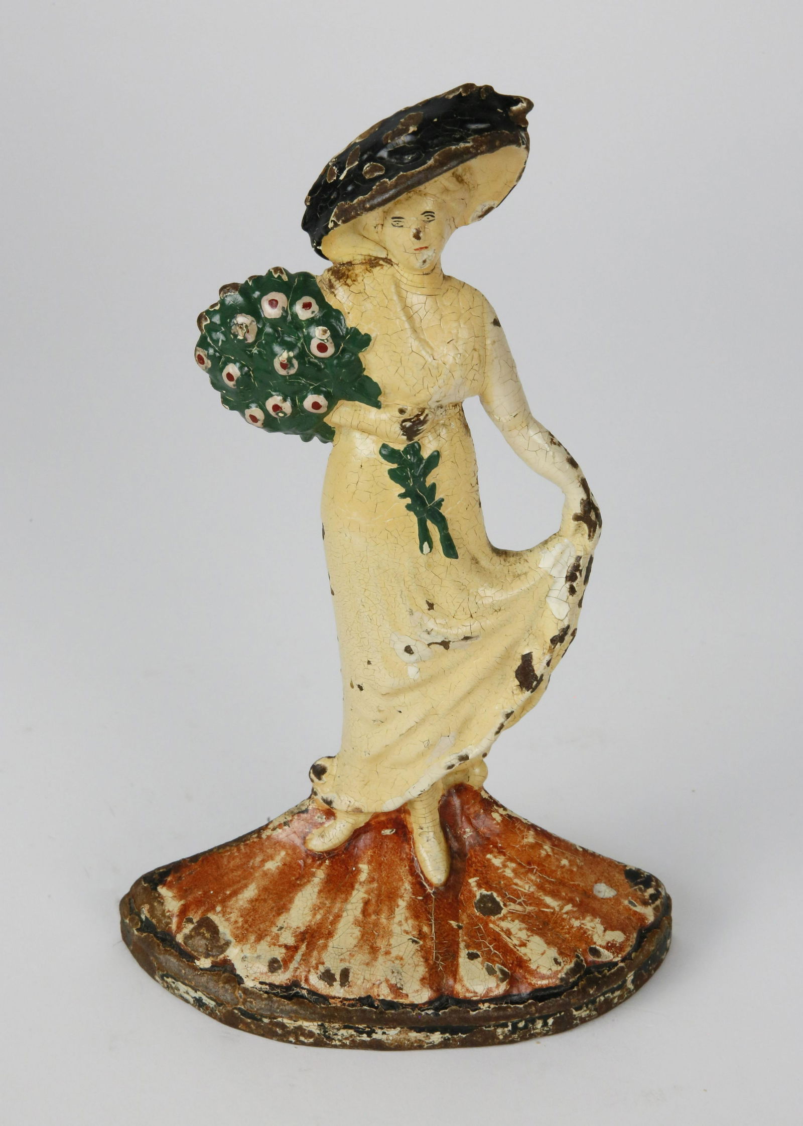 Vintage Painted Cast Iron Doorstop Lady Holding Bouquet (1 of 5)