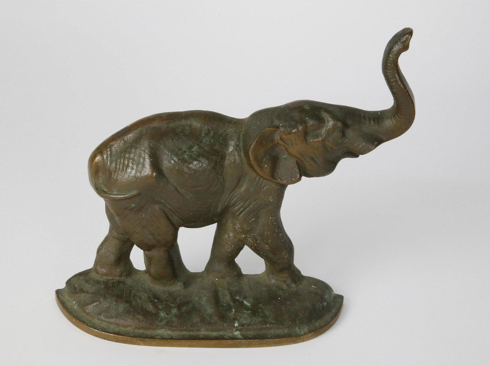 Patina Bronze Trumpeting Elephant Doorstop: Patina Bronze Trumpeting Elephant Doorstop Height 8.25 in.