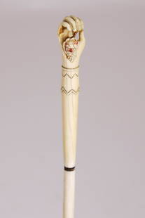 Antique Whale Ivory Lady's Pointer, 19th Century: Antique Whale Ivory Lady's Pointer, 19th Century, with hand carved hand with red stained rose blossom in the palm, scrimshaw cuff, baleen separator Length 29.5 in.