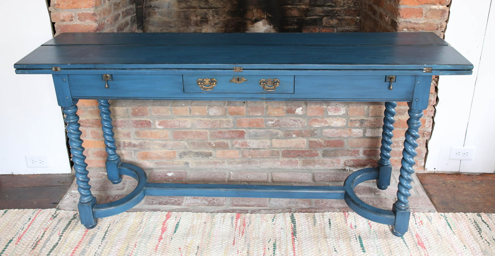 Blue Painted Narrow Console Extension Table: Blue Painted Narrow Console Extension Table, 20th Century, with barley twisted legs and stretcher Height 30.5 Length 64 in. Depth 16.25 in. Open 32.25 in.