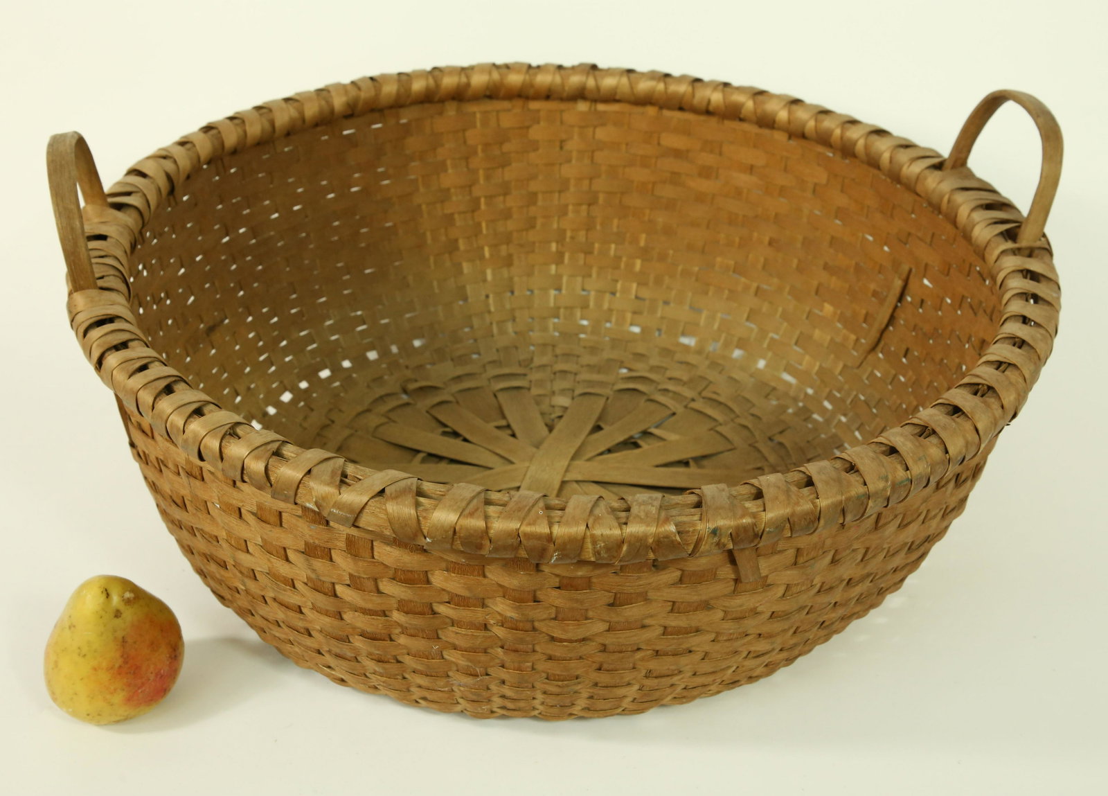 New England Large Splint Woven Work Basket: New England Large Splint Woven Work Basket, finely woven with attached hoop handles Height 9 in. Diameter 24 in.