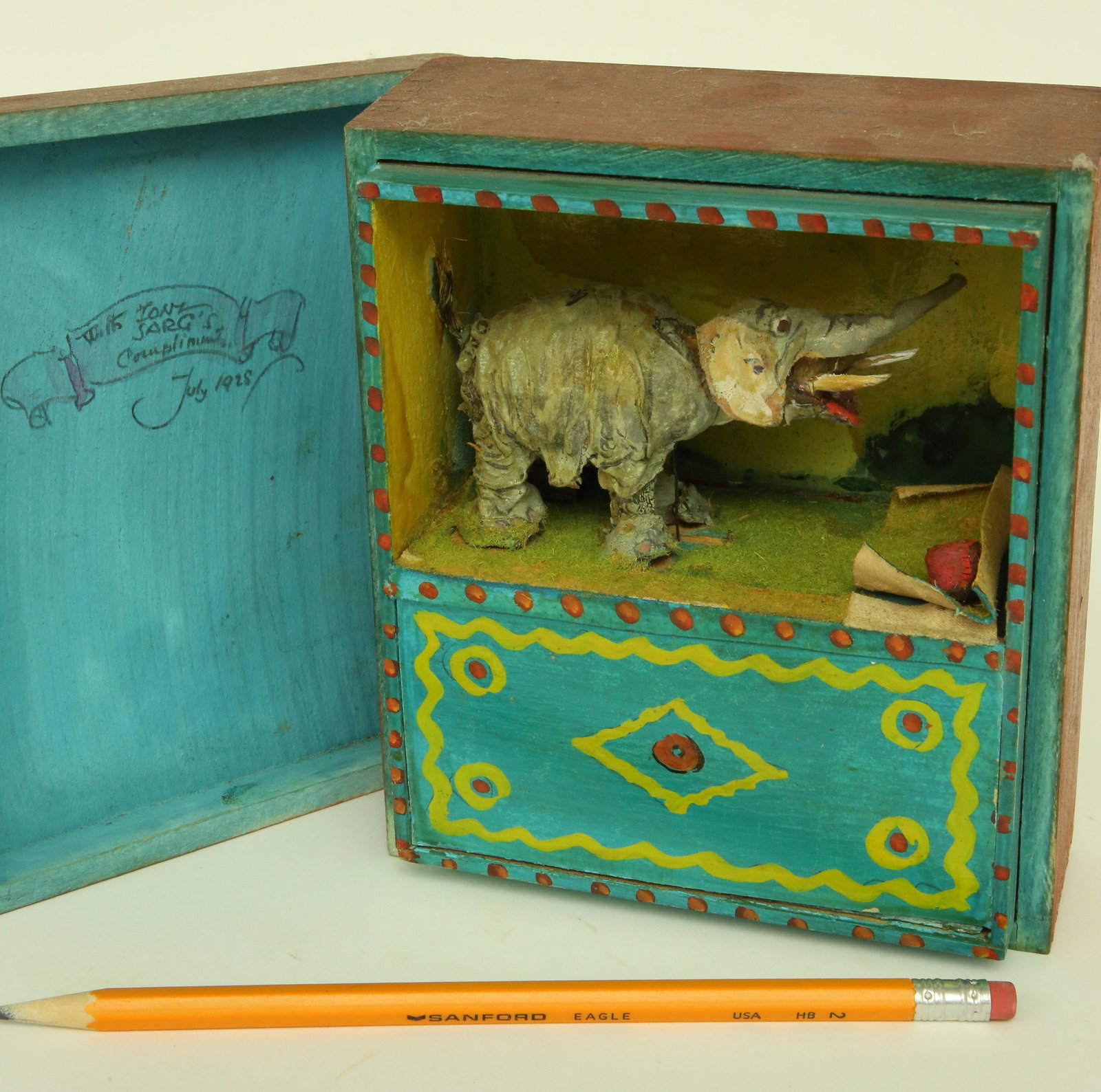 Tony Sarg One of A Kind Gift to Pete Mitchell "Her Own Little Elephant": Tony Sarg (1880-1942) One of A Kind Gift to Pete Mitchell "Her Own Little Elephant", the interior fitted with a crank driven bobbing elephant with chime, inscribed on interior With Tony Sarg's Complim