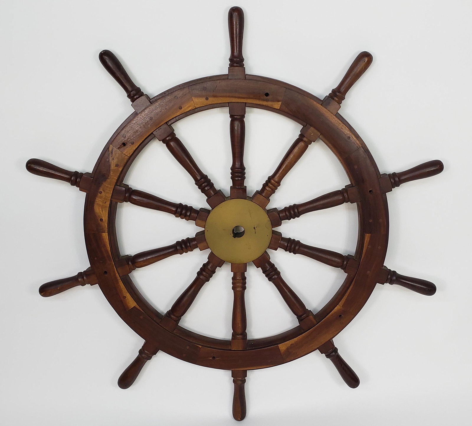 Vintage Lignum Vitae Ten-Spoke Captain's Ship Yacht Wheel: Vintage Lignum Vitae Ten-Spoke Captain's Ship Yacht Wheel, with brass hub 48 in. x 48.5 in.
