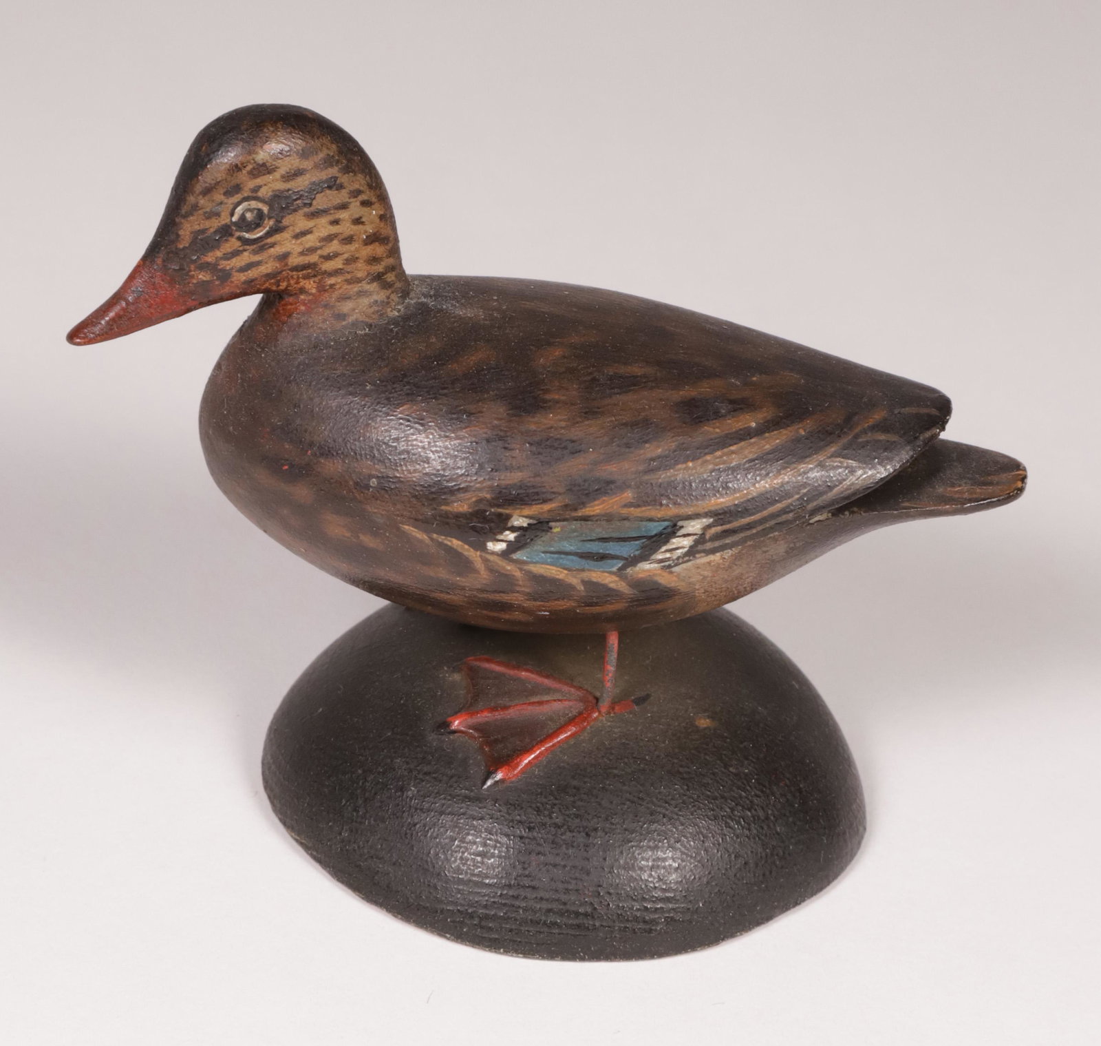 Elmer Crowell Miniature Mallard Hen Duck Decoy: Elmer Crowell (1862-1951) Miniature Mallard Hen Duck Decoy, stamped upon the base A.E. Crowell, East Harwich Mass. Height 3 in. Length 3.75 in. Width 2.5 in. Provenance: The Estate of Stephen Weinroth