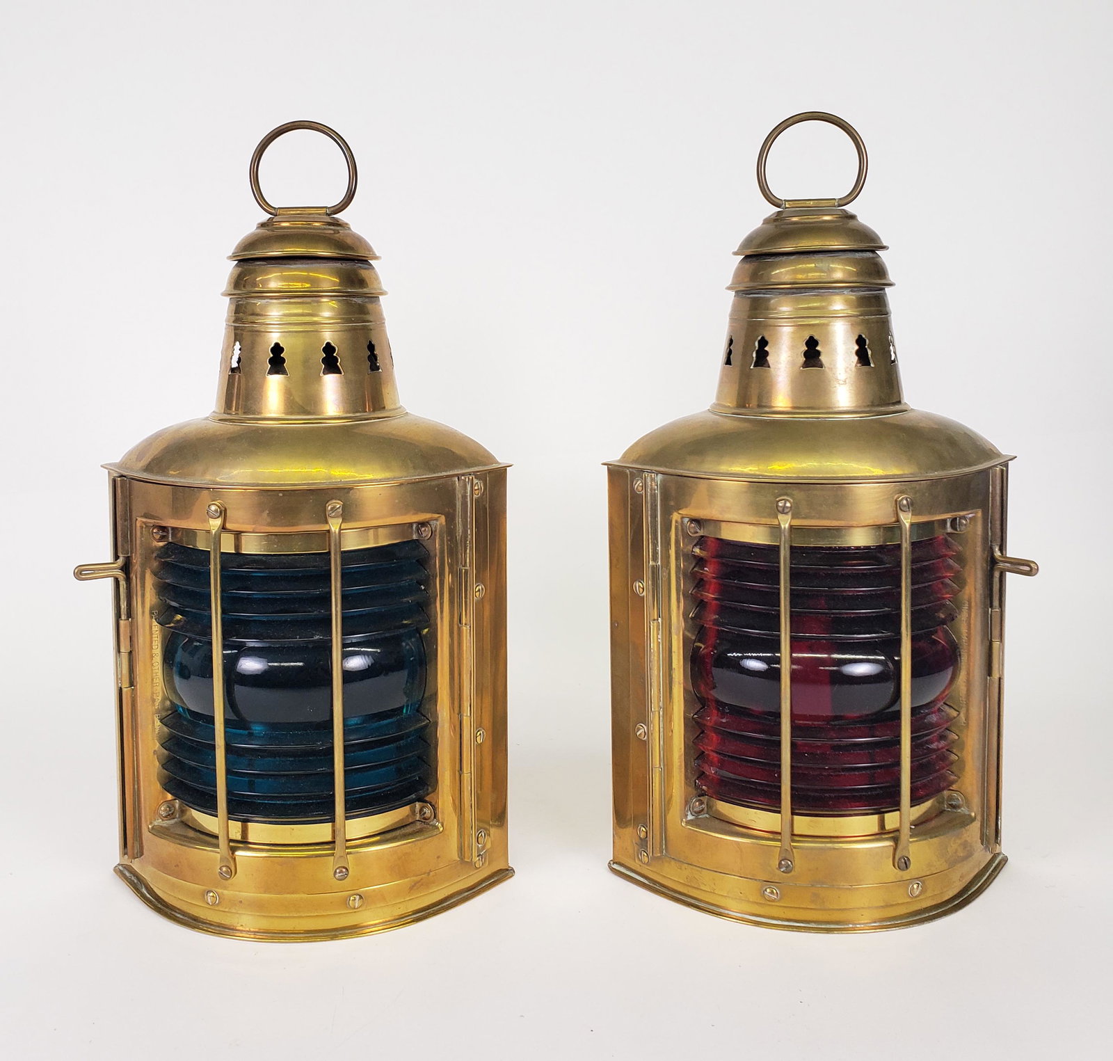 Pair of Antique Perkins Brass Port and Starboard Ship Light Lanterns: Pair of Antique Perkins Brass Port and Starboard Ship Light Lanterns, Perko Marine Lamp and Hardware Corp. Brooklyn, New York, each signed. Height 13.75 in. Width 7.5 in. Depth 6.25 in.