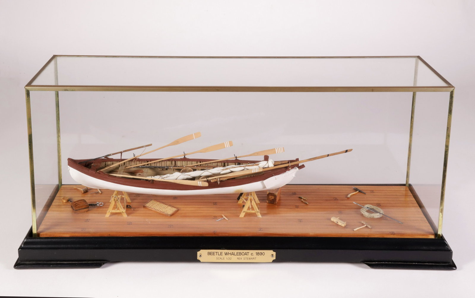 Contemporary Cased Model of a Beetle Whaleboat by Rex Stewart: Contemporary Cased Model Of A Beetle Whaleboat, circa 1890, scale 1: 32 hand-crafted by Rex Stewart, wood and mixed media Height 8 in. Length 19.25 in. Width 6 in. Provenance: The Estate of Stephen We