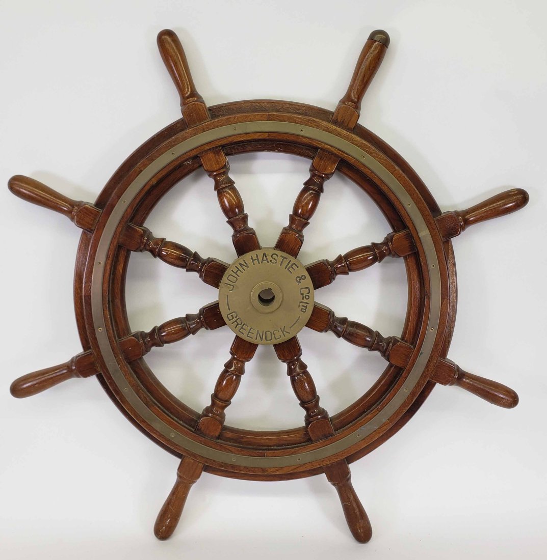 Antique John Hastie Eight-Spoke Captain's Ship Wheel, 19th century: Antique John Hastie Eight-Spoke Captain's Ship Wheel, 19th century, Greenock, Scotland, with a brass hub inscribed, "John Hastie & Co Ltd, Greenock", mahogany and brass construction. Diameter 36 in.