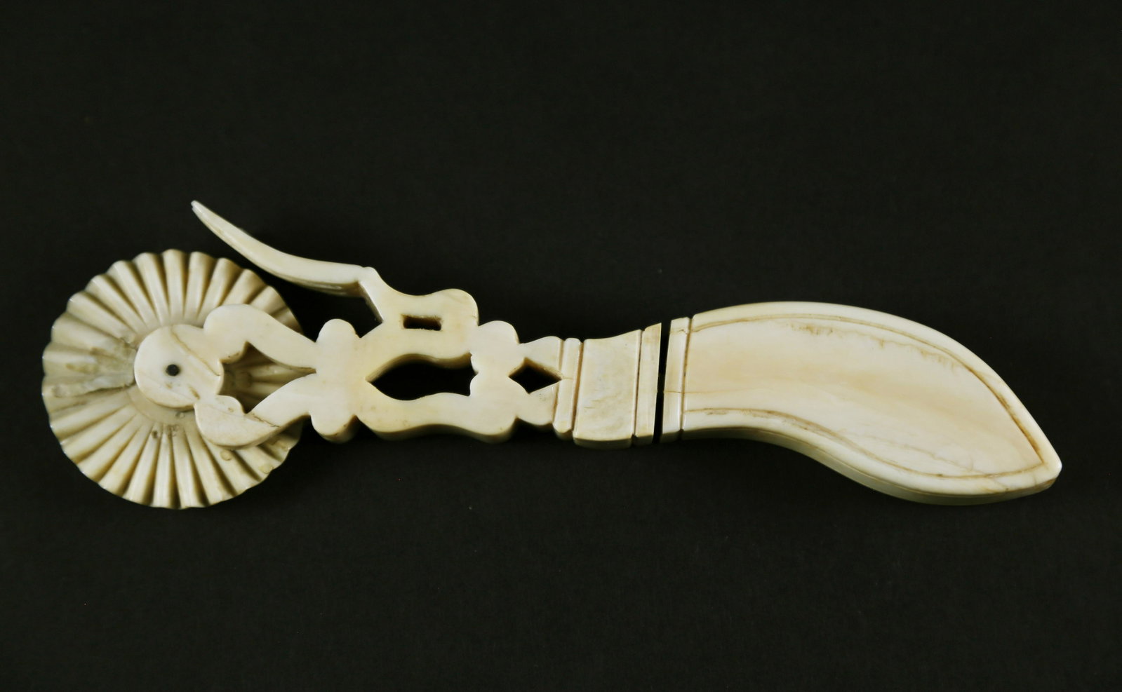 Whaleman Made Antique Pie Crimper, circa 1850: Whaleman Made Antique Pie Crimper, circa 1850, a solid zigzag wheel pinned to an open-work section with a three-tine fork (one tine as is), joined to a pistol form grip, lacking spacer in handle. Leng