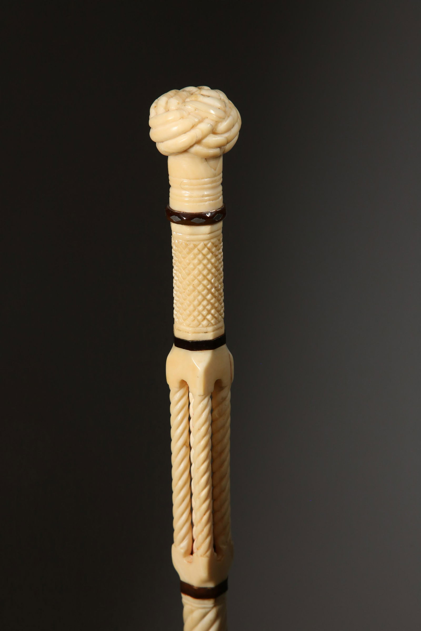Whaleman Made Turk's Knot Walking Stick, circa 1850: Whaleman Made Walking Stick, circa 1850, very fine and delicate antique whale ivory carved Turk's knot with tortoiseshell band with silver diamond inlay, fine cross-hatched section above open-work col