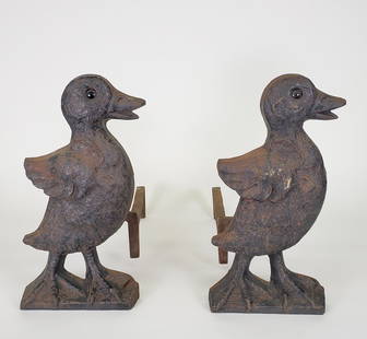 Pair of Antique Howes Foundry Cast Iron Figural Duck Andirons: Pair of Antique Howes Foundry (Boston 1870-1930) Cast Iron Figural Duck Andirons, each marked, "Howes 3006", with glass eyes. Height 12.75 in. Width 7 in. Depth 17.5 in.