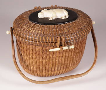 Jose Formoso Reyes Nantucket Friendship Basket, circa 1960: Jose Formoso Reyes (1902-1980)Nantucket Friendship Basket, circa 1960, with carved hippo on ebony lid, very faintly signed upon the base Height 6 in. Width 8.5 in. Depth 6.25 in.