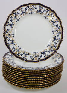 Set of Twelve Antique Royal Doulton Burslem Cobalt and Gold Dinner Plates: Set of Twelve Antique Royal Doulton Burslem Cobalt and Gold Dinner Plates, fluted and molded edge with gilt highlights and rims Diameter 10 in.