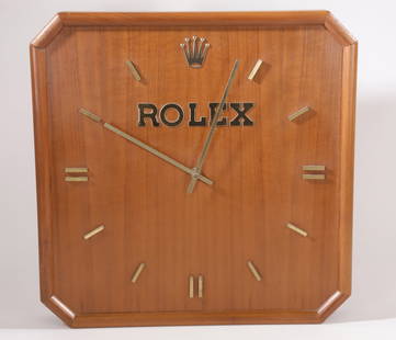 Scarce Vintage Rolex Watches Store Clock, circa 1980s: Scarce Vintage Rolex Watches Store Clock Circa 1980s, Japanese Quartz battery powered movement, given by Rolex to authorized dealers for shop display Height 16.25 in. Width 16.25 in Depth 2.5 in.