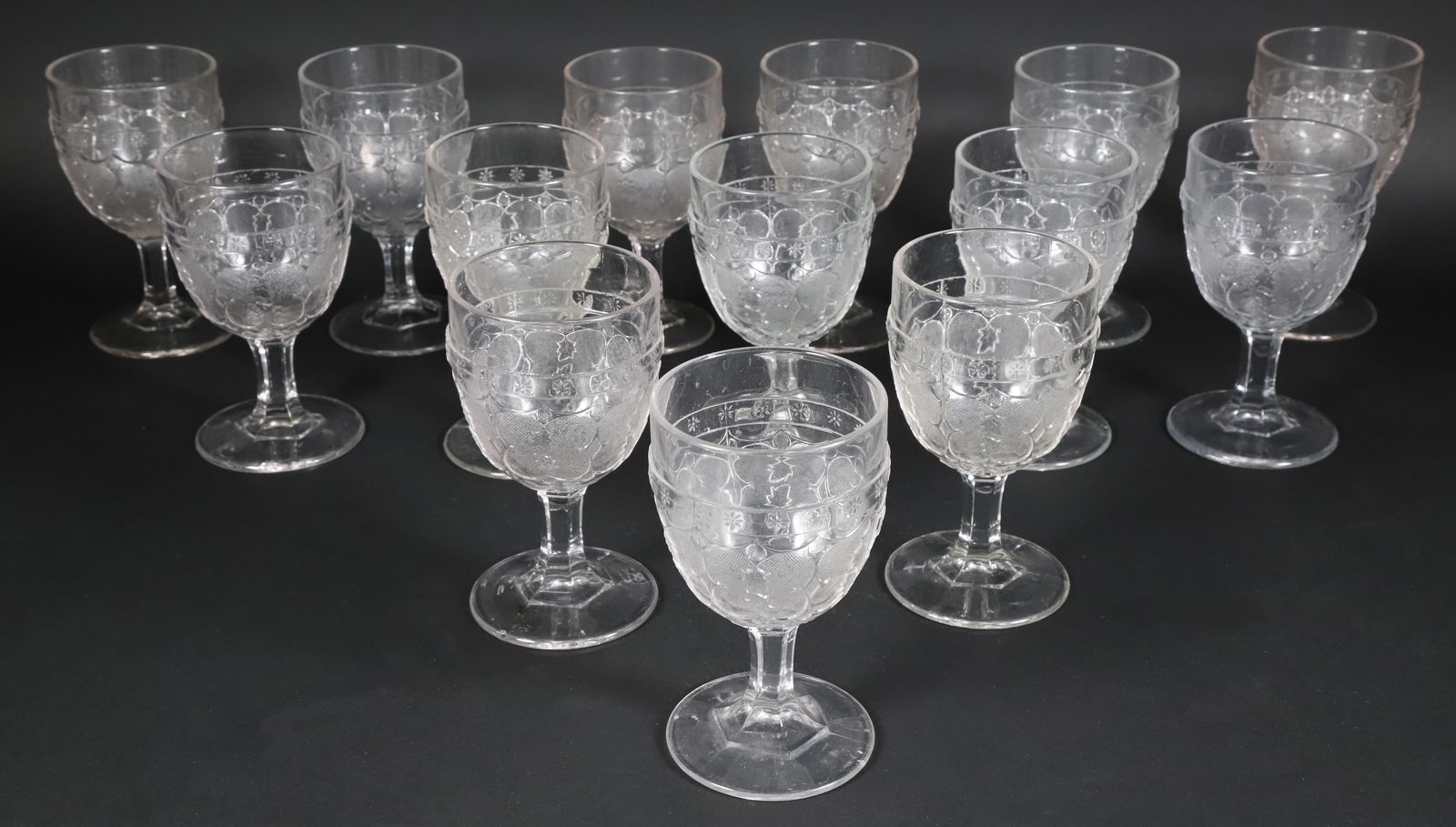 Set of Fourteen American Pressed Pattern Glass Wine Goblets, circa 1840: Set of Fourteen American Pressed Pattern Glass Wine Goblets, circa 1840 Height 6 in. Diameter 3.5 in.