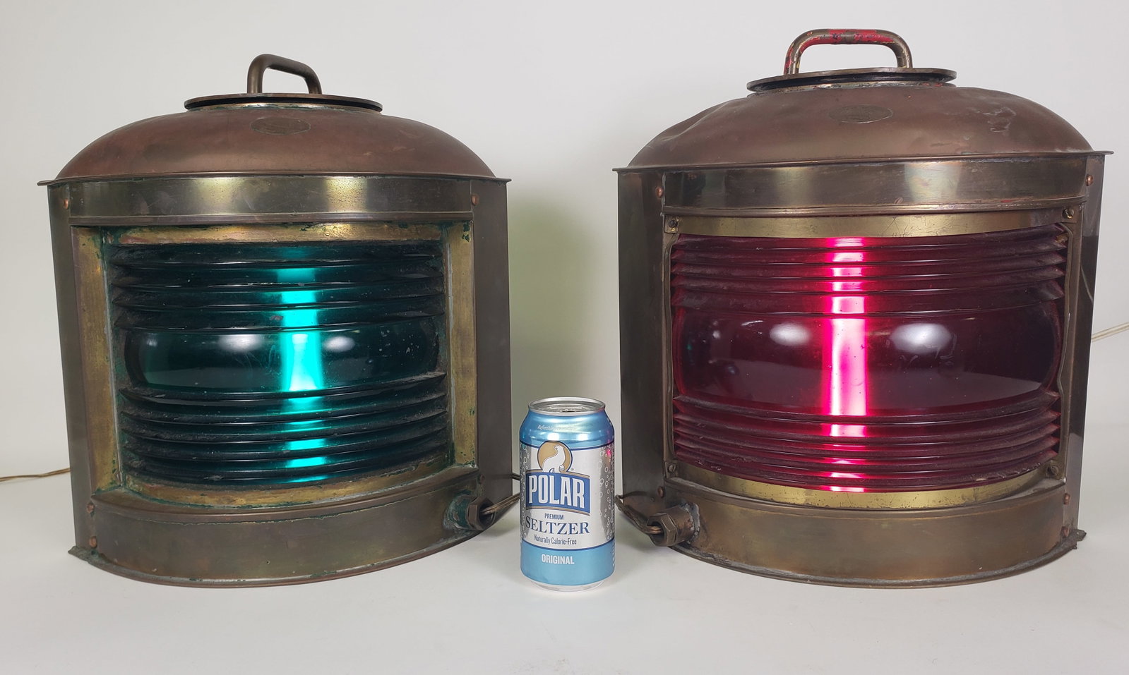 Pair of Giant Antique Perkins Brass Port and Starboard Ship Light Lanterns: Pair of Giant Antique Perkins Brass Port and Starboard Ship Light Lanterns, Perko Marine Lamp and Hardware Corp. Brooklyn, New York, each signed, electrified, each glass and hatch cover is also marked