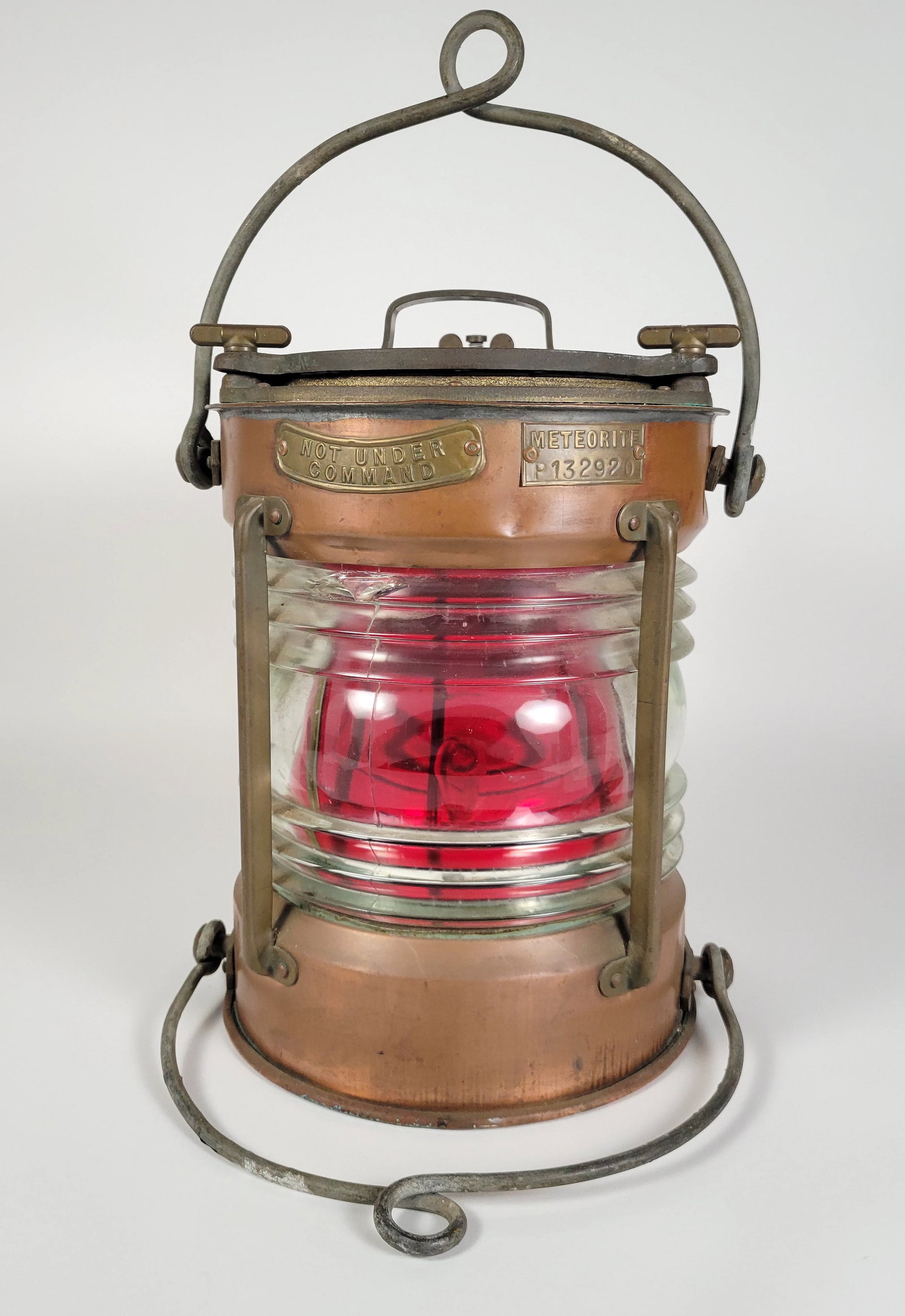 Vintage 1940s World War 2 Meteorite Ship's Masthead Nautical Lantern: Vintage 1940s World War 2 Meteorite Ship's Masthead Nautical Lantern, copper body, heavy cast brass screw down lid, thick Fresnel lens with interior red glass liner, top and bottom securing bails, ori