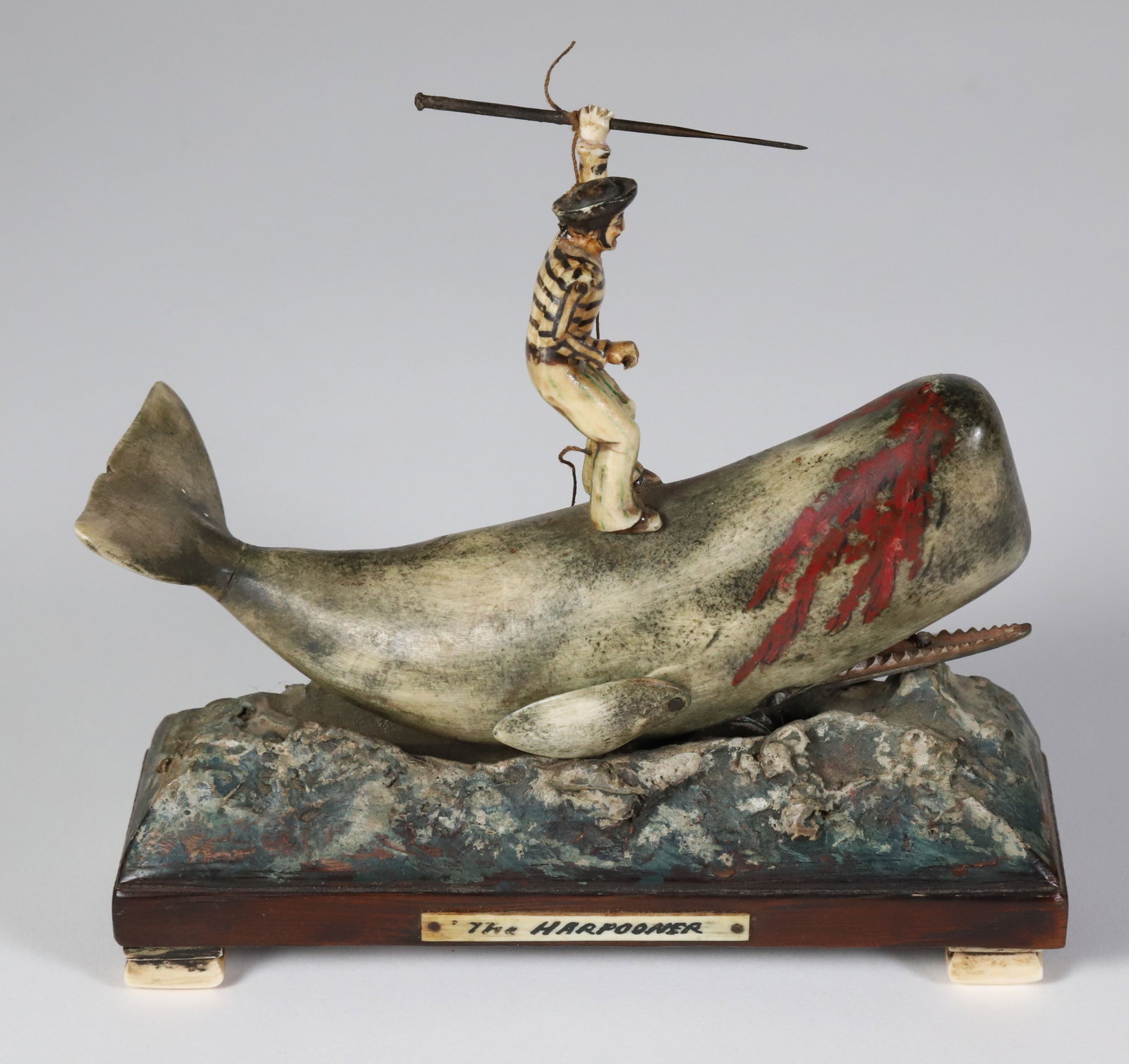 "The Harpooner" Whaler Made Mechanical Whale, 19th Century: "The Harpooner" Whaler Made Mechanical Whale, 19th Century, polychromed and carved sailor atop a sperm whale holding a harpoon, a crank on the reverse activates the whale to bob and open its mouth. Cr