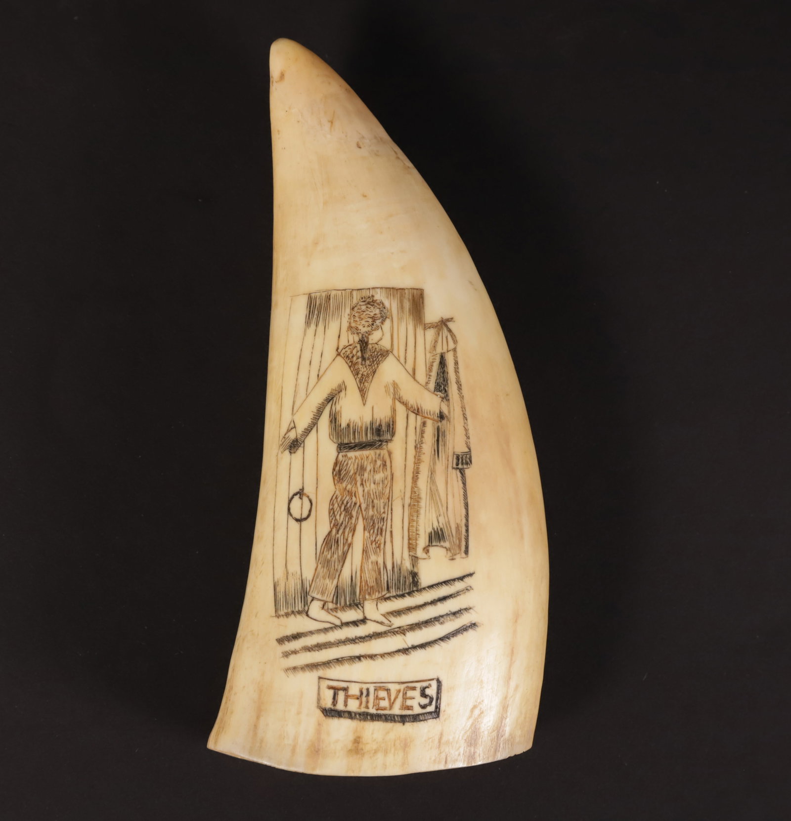 Whaleman Scrimshawed "Thieves Reward" Antique Whale Tooth, 19th Century: Whaleman Scrimshawed "Thieves Reward" Antique Whale Tooth, 19th Century, engraved on both sides. A larger version of the Thieves Reward scrimshaw whale tooth sold at Rafael Osona's auction August 14, 