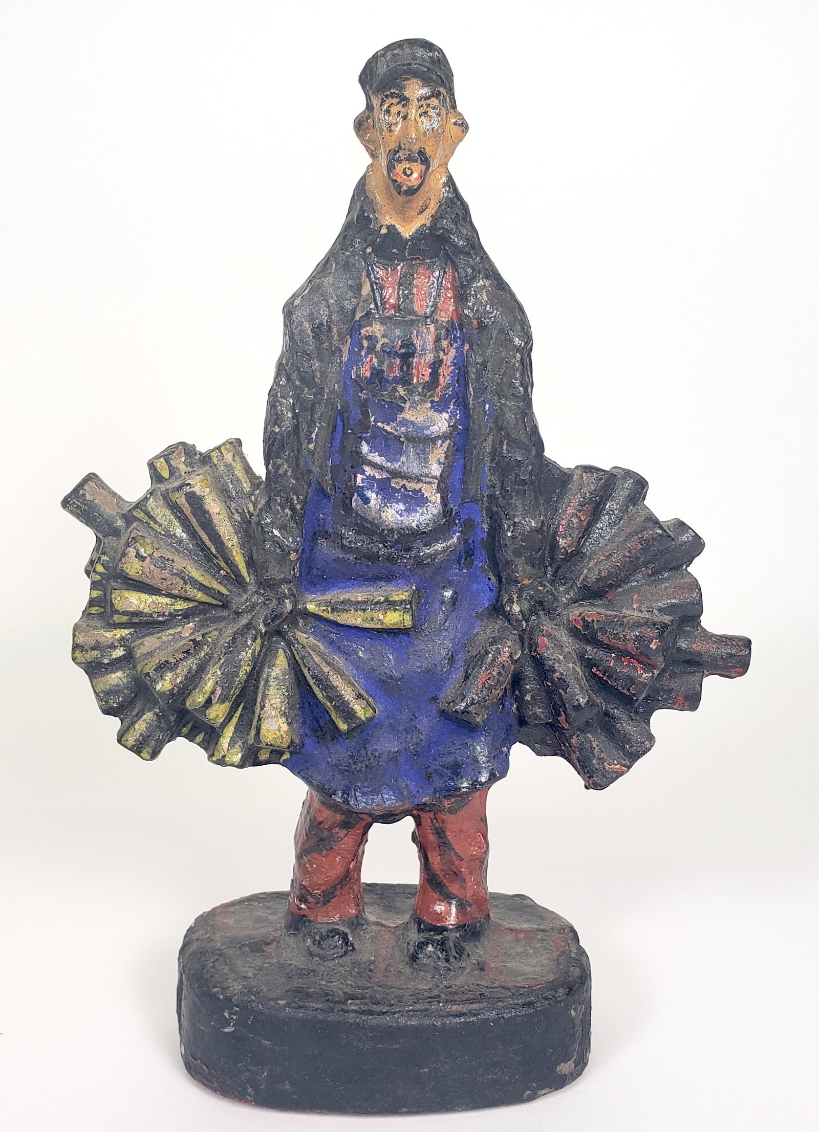 Antique Cast Plaster Figural Wine Merchant Doorstop, circa 1920s: Antique Cast Plaster Figural Wine Merchant Doorstop, circa 1920s Height 9.75 in. Width 7 in. Depth 2.75 in.