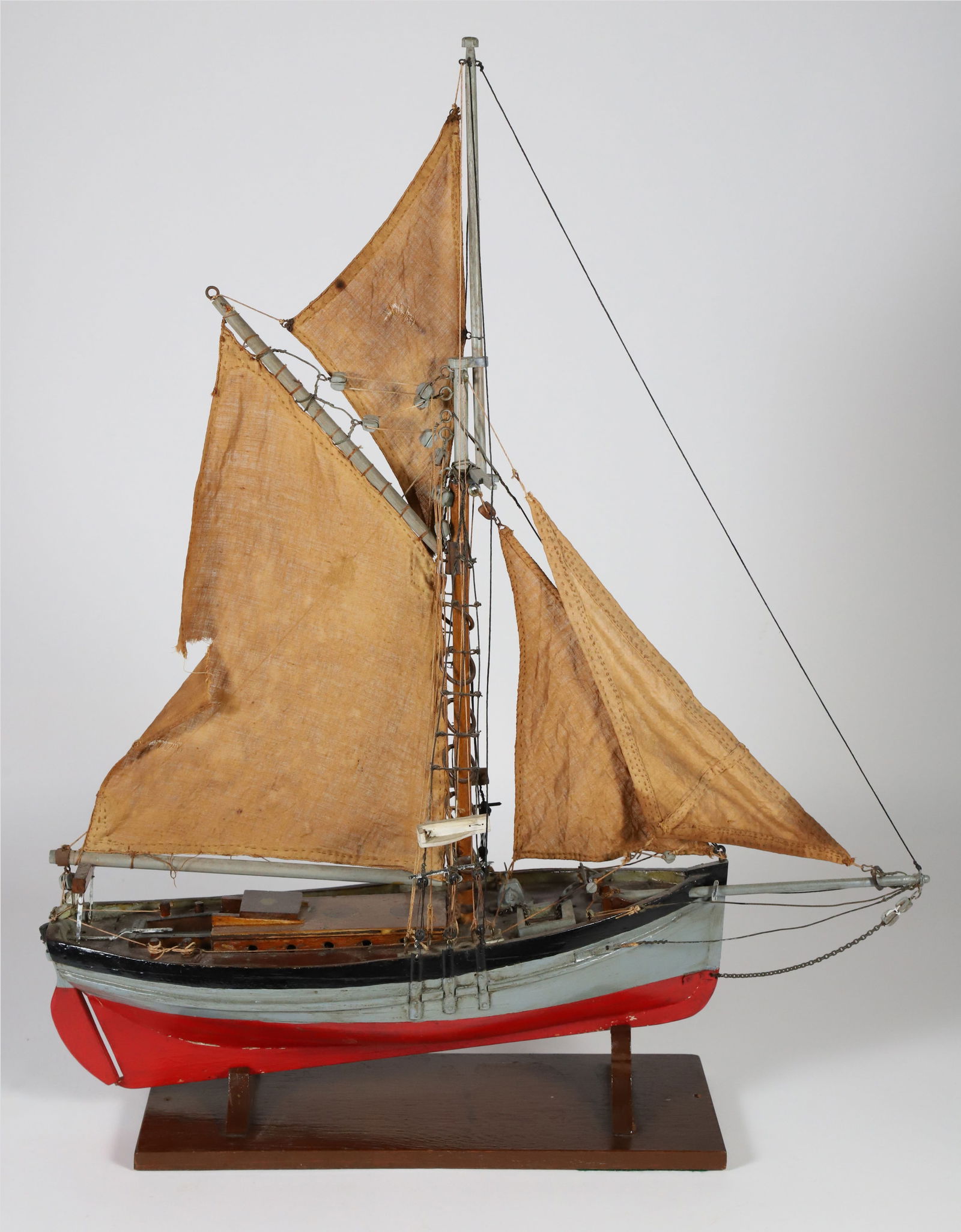 Detailed Model of a Sailing Ship: Detailed Model of a Sailing Ship, carved wood and polychromed with original sails Height 25.5 in. Length 21 in. Width 5 in.