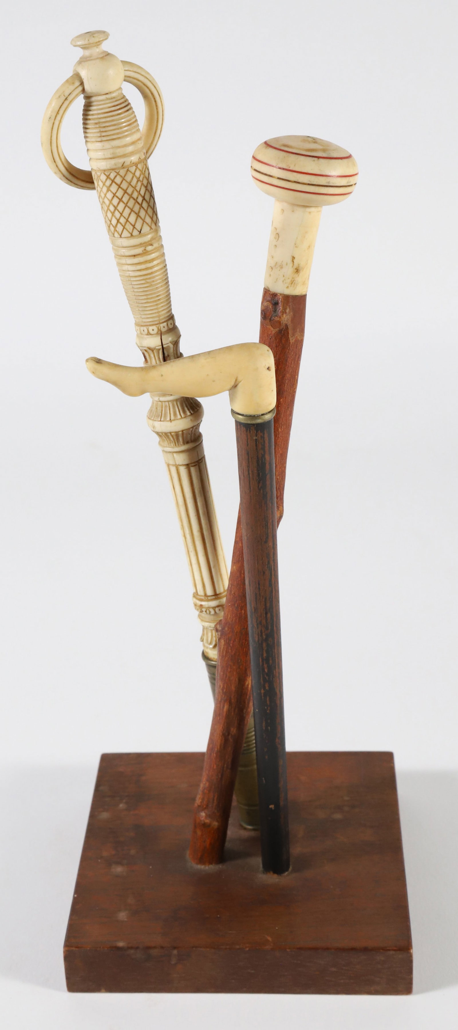 Collection of Two Carved Walking Stick Handles and One Parasol Handle, 19th Century (1 of 4)