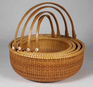 Nest of Four Bill and Judy Sayle Round Swing Handle Nantucket Baskets