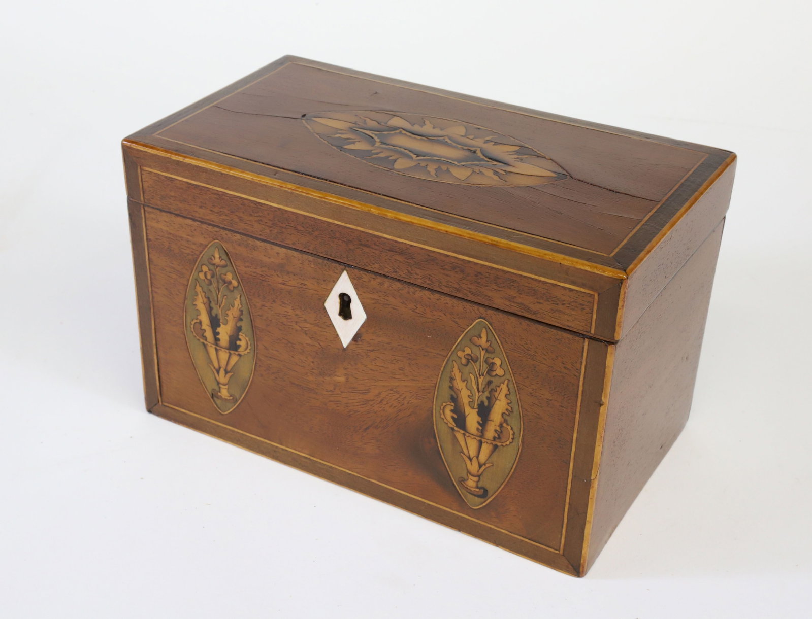 Mahogany Inlaid Tea Caddy, 19th Century: Mahogany Inlaid Tea Caddy, 19th Century, inlaid on the front with flowers and urns, either side of a bone key hole escutcheon; the top boasting a sunburst paterae inlay, two lids to the interior withs