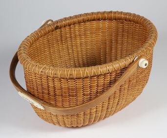 William and J. Reis Oval Swing Handle Nantucket Basket, circa 1973