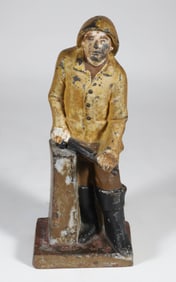 Antique Cast Iron Fisherman at the Tiller Doorstop