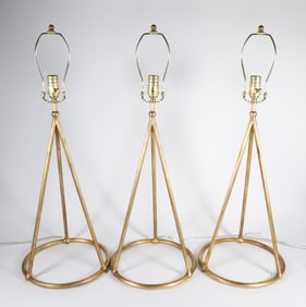 Three Gilt Metal Tripod Table Lamps