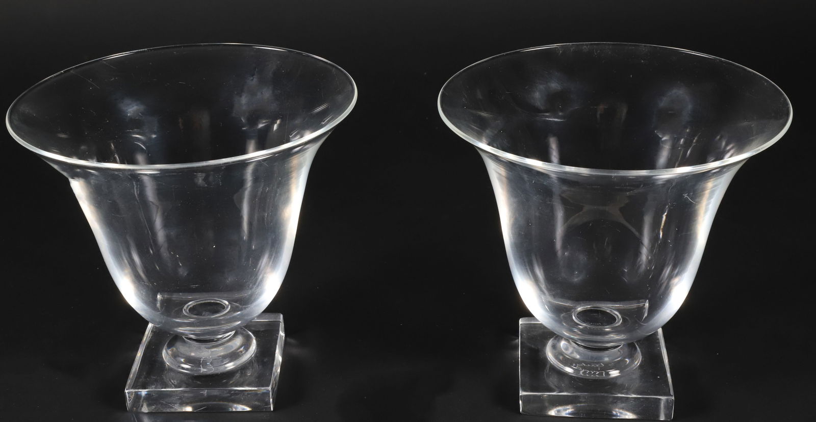 Pair of Signed Steuben Glass Urns on Square Plinths: Pair of Signed Steuben Glass Urns on Square Plinths 5.5 in. x 6 in. Provenance: The Estate of Carole Webster, Nantucket Island, Massachusetts